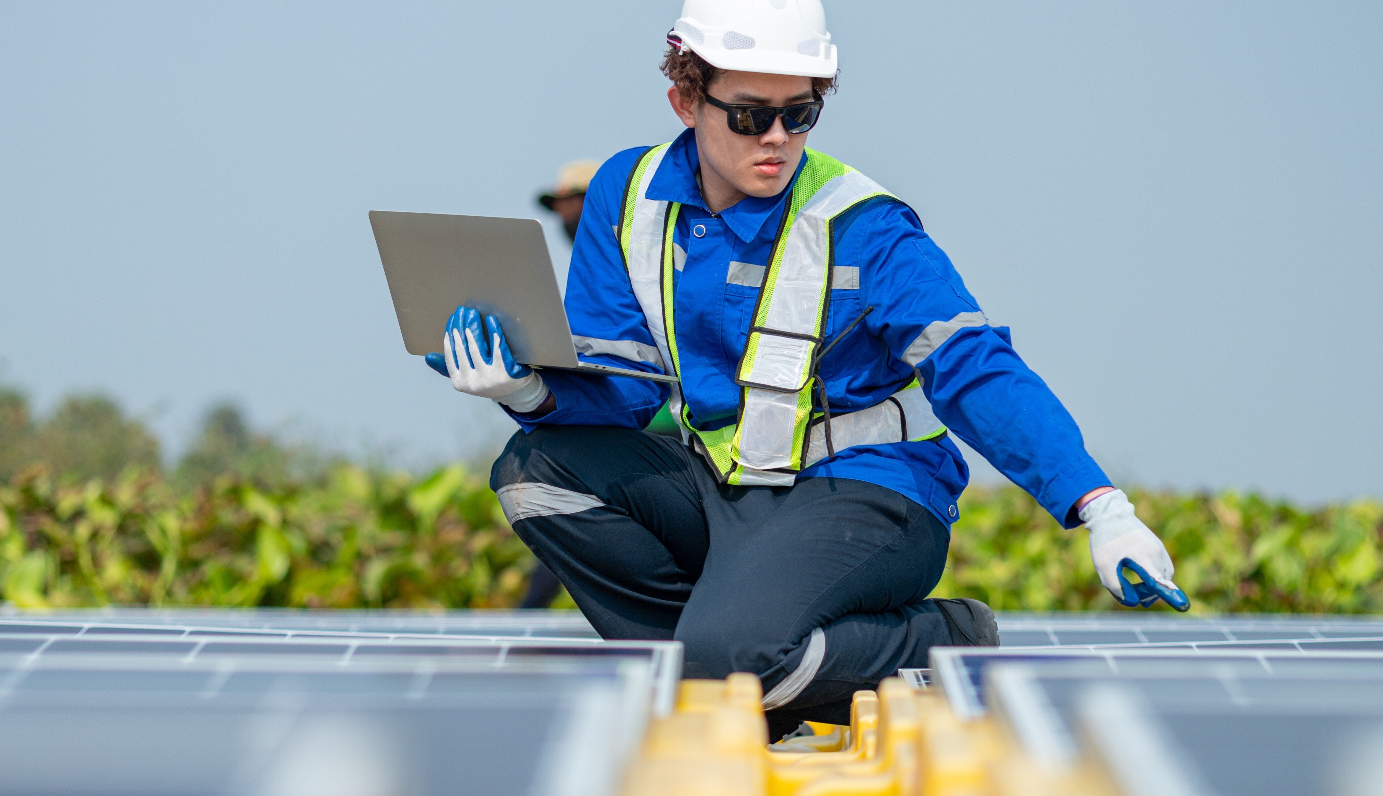 man-on-solar-array
